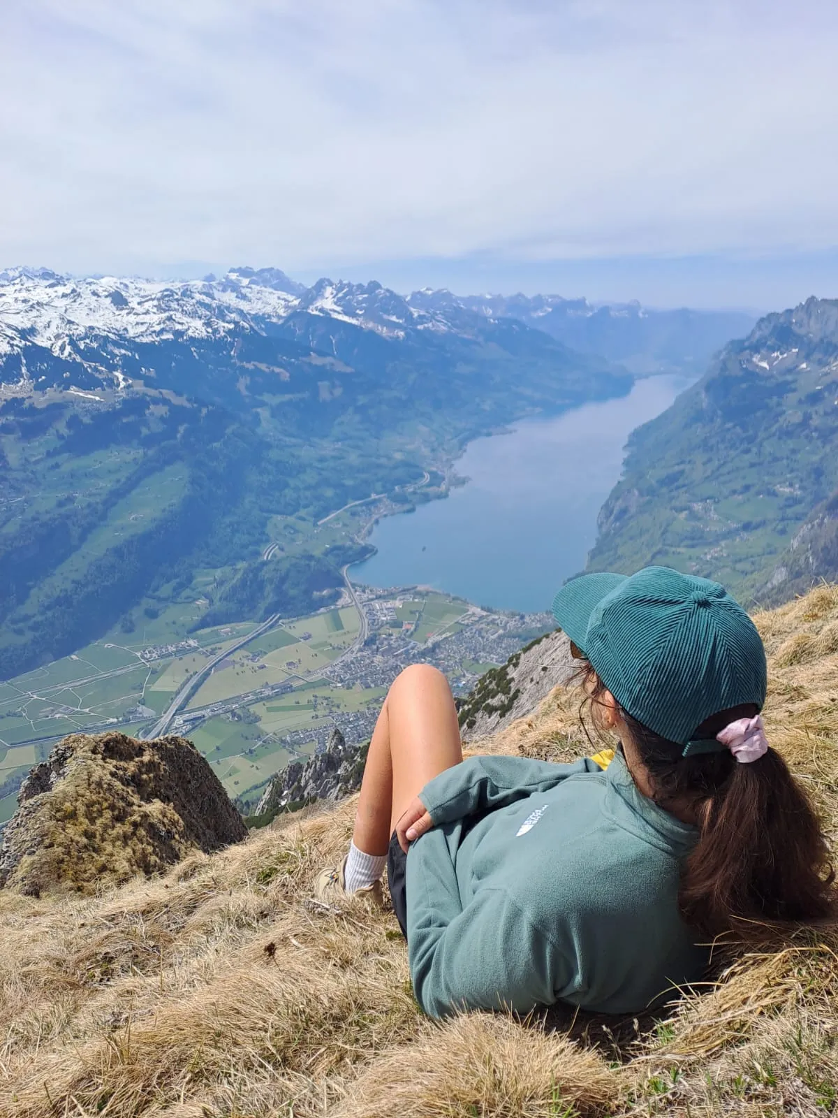 A break near the summit, lying on dry grass and looking out over the length of the Walensee.