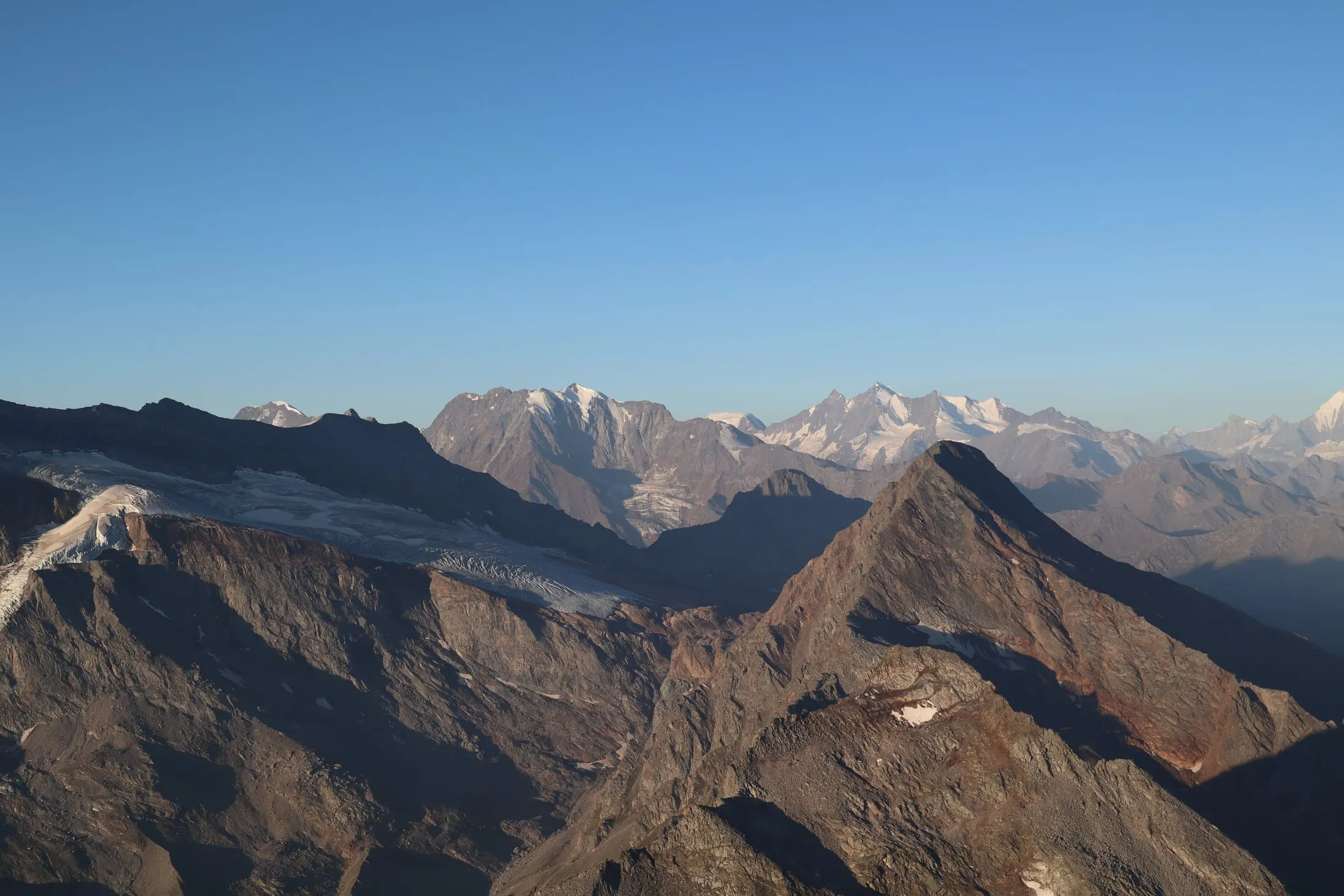 View toward glaciated peaks of the Walliser Alpen from near the summit.