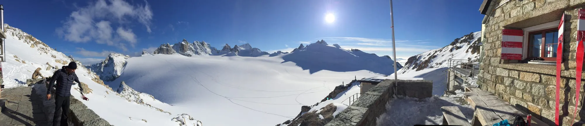 The Cabane du Trient SAC hut perched on a rocky bluff above the Trient glacier basin.