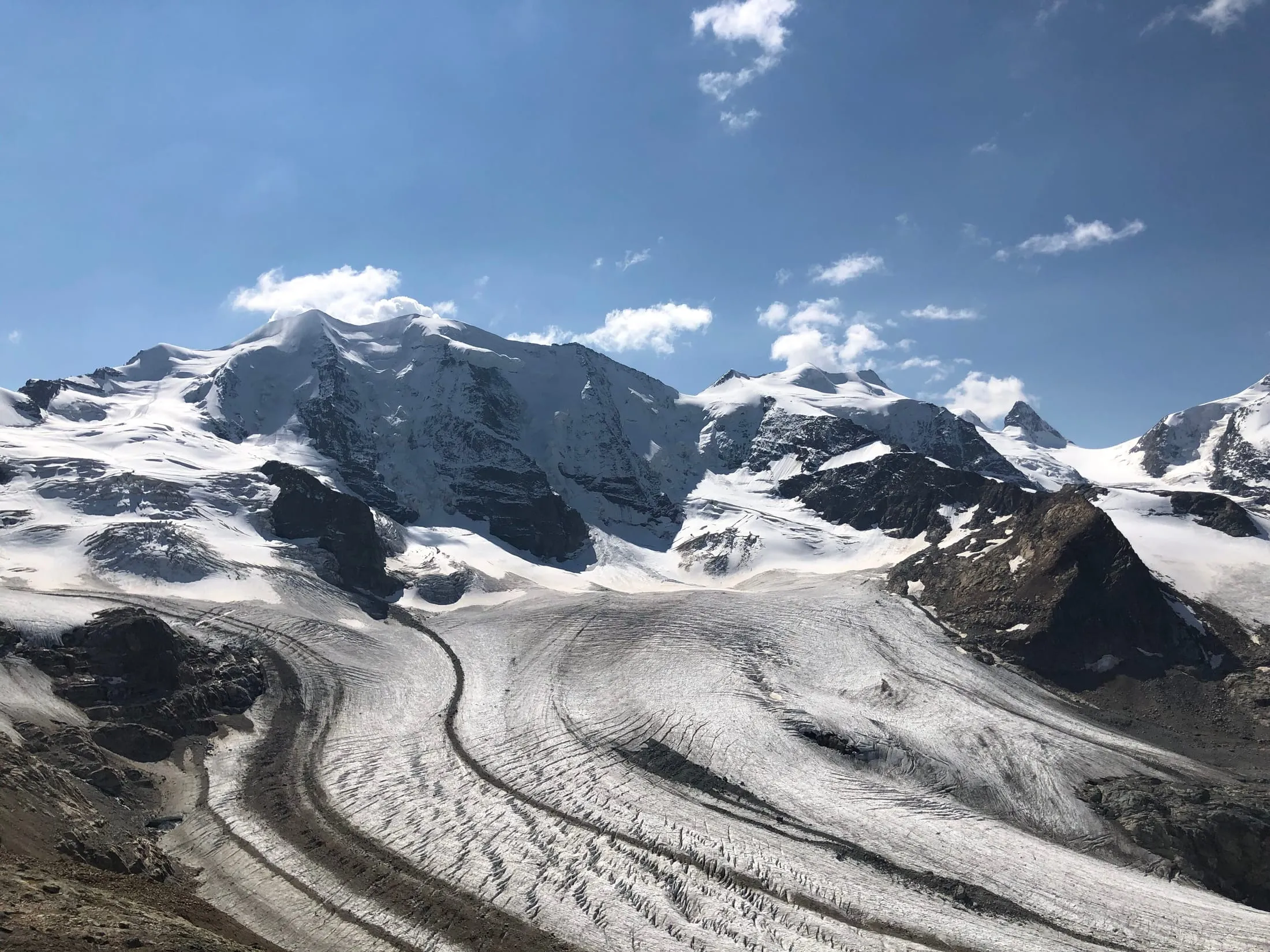 Piz Palü with its snow flanks above the Morteratsch glacier, seen from Diavolezza.
