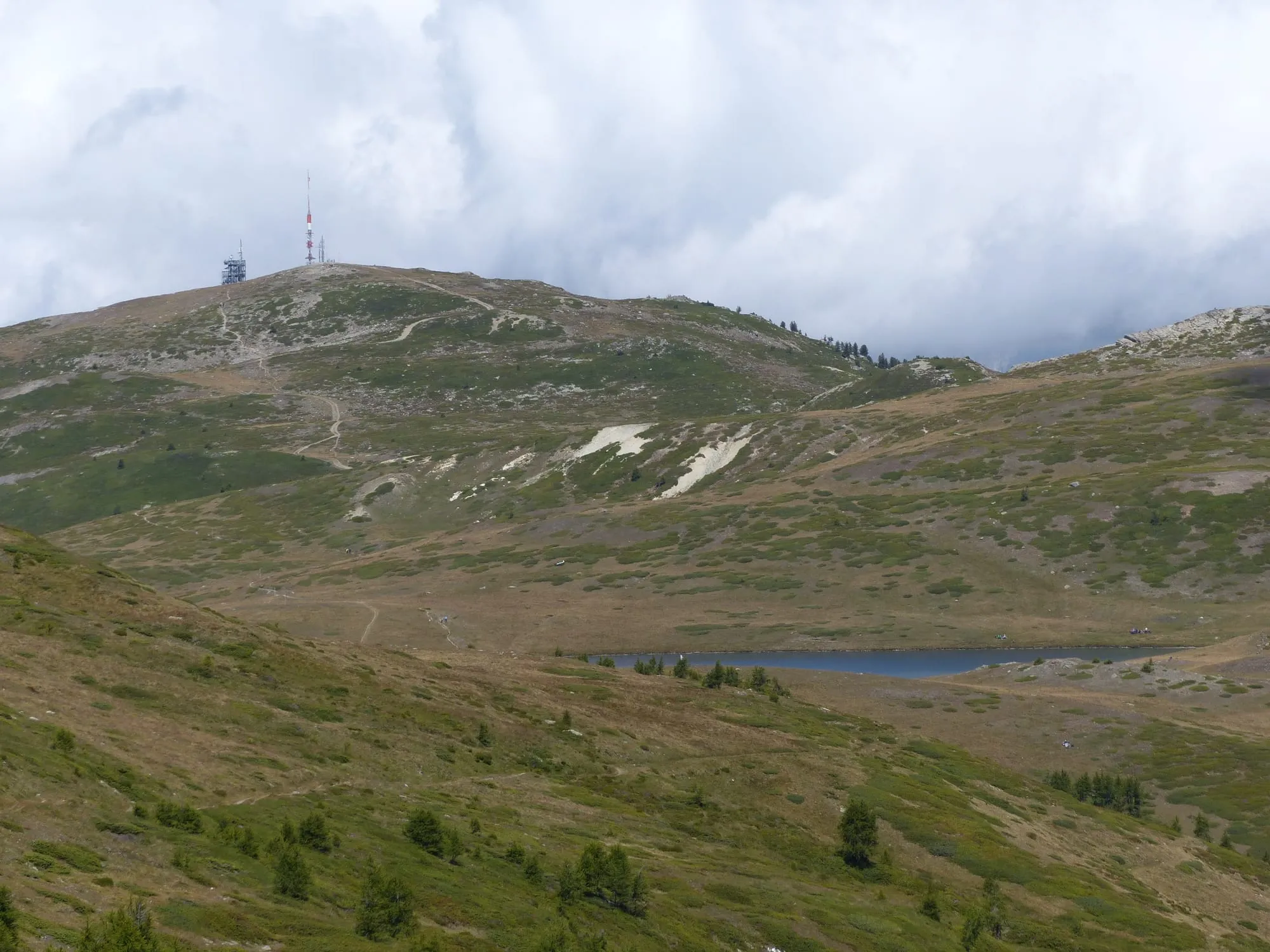 The Gibidumsee lake and Gibidumpass ridge above Visperterminen in summer.