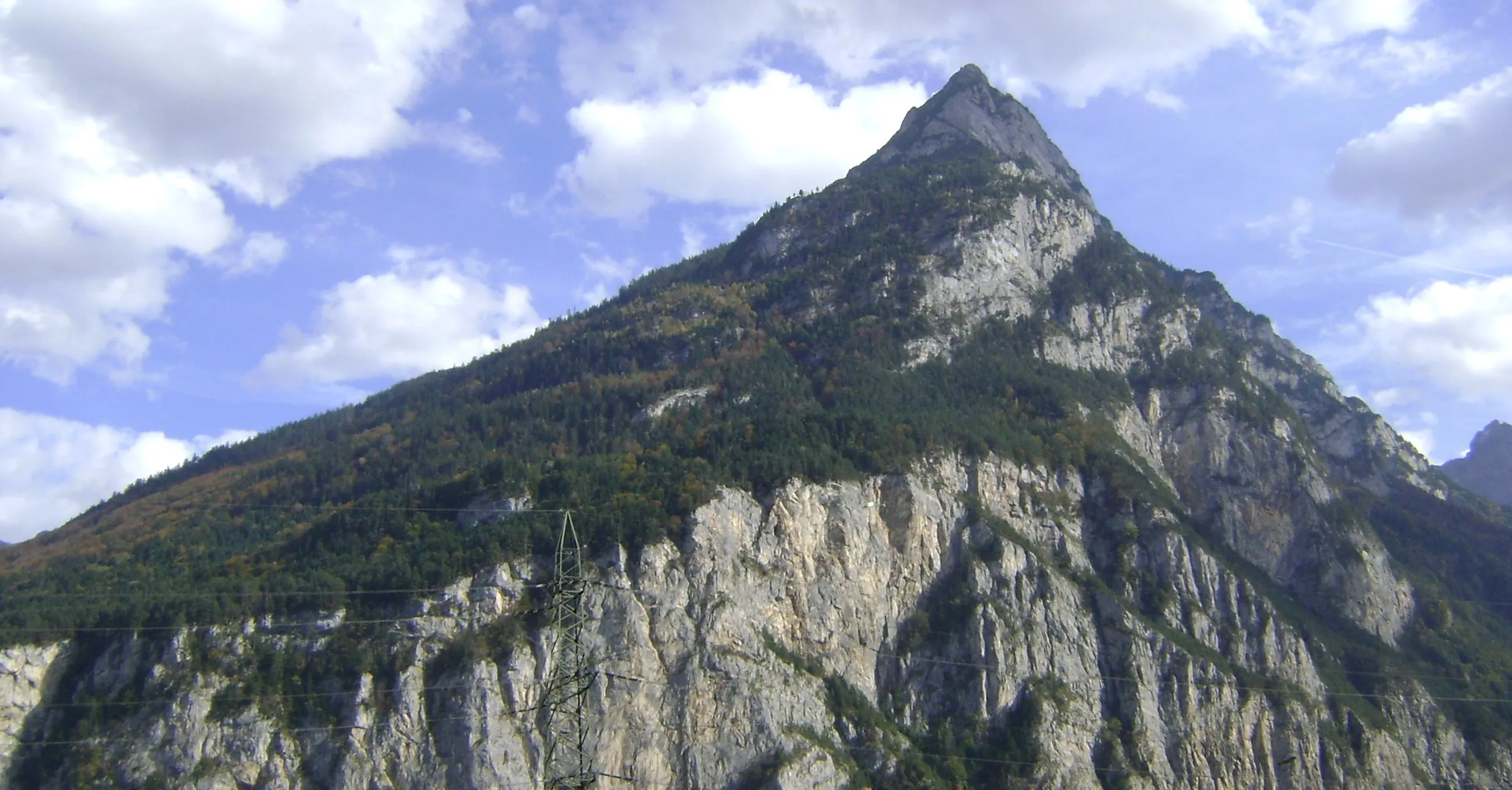 The snow-free rock pyramid of the Bälmeten (2416 m) above the Reuss valley near Schattdorf.