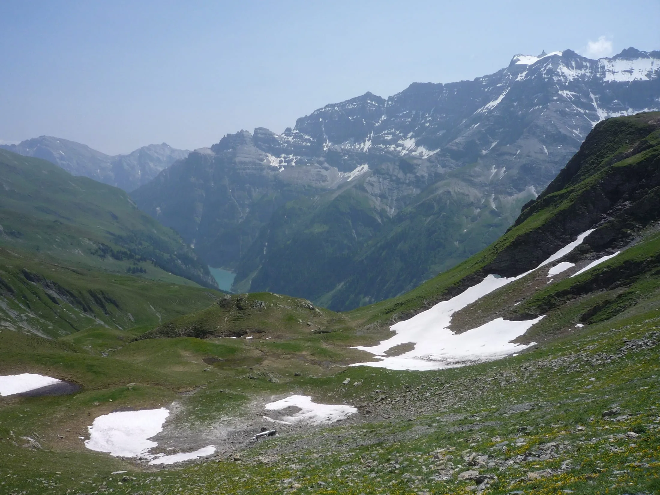 The Calfeisental with the turquoise Gigerwald reservoir, ringed by the mountains of the Sardona region.