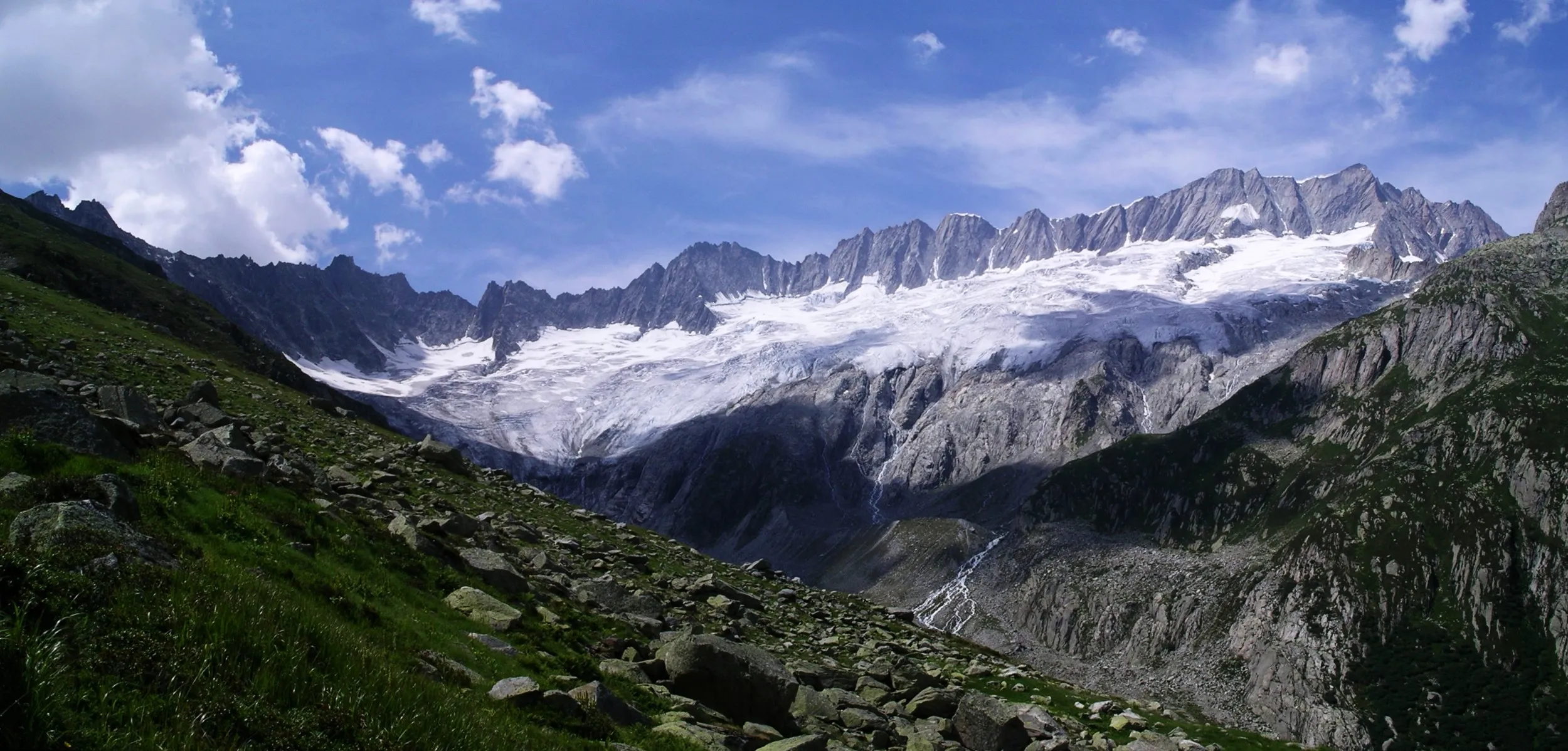 The glaciated crest of the Dammastock, highest summit of the Uri Alps, in summer from the east.