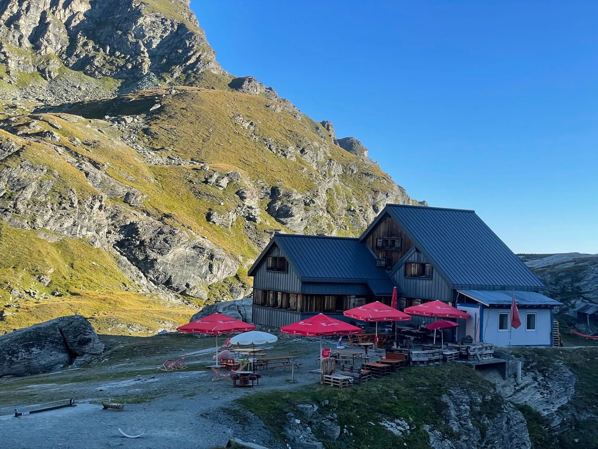 The Cabane de Prafleuri SAC hut in its stony alpine cirque above the Grande Dixence.