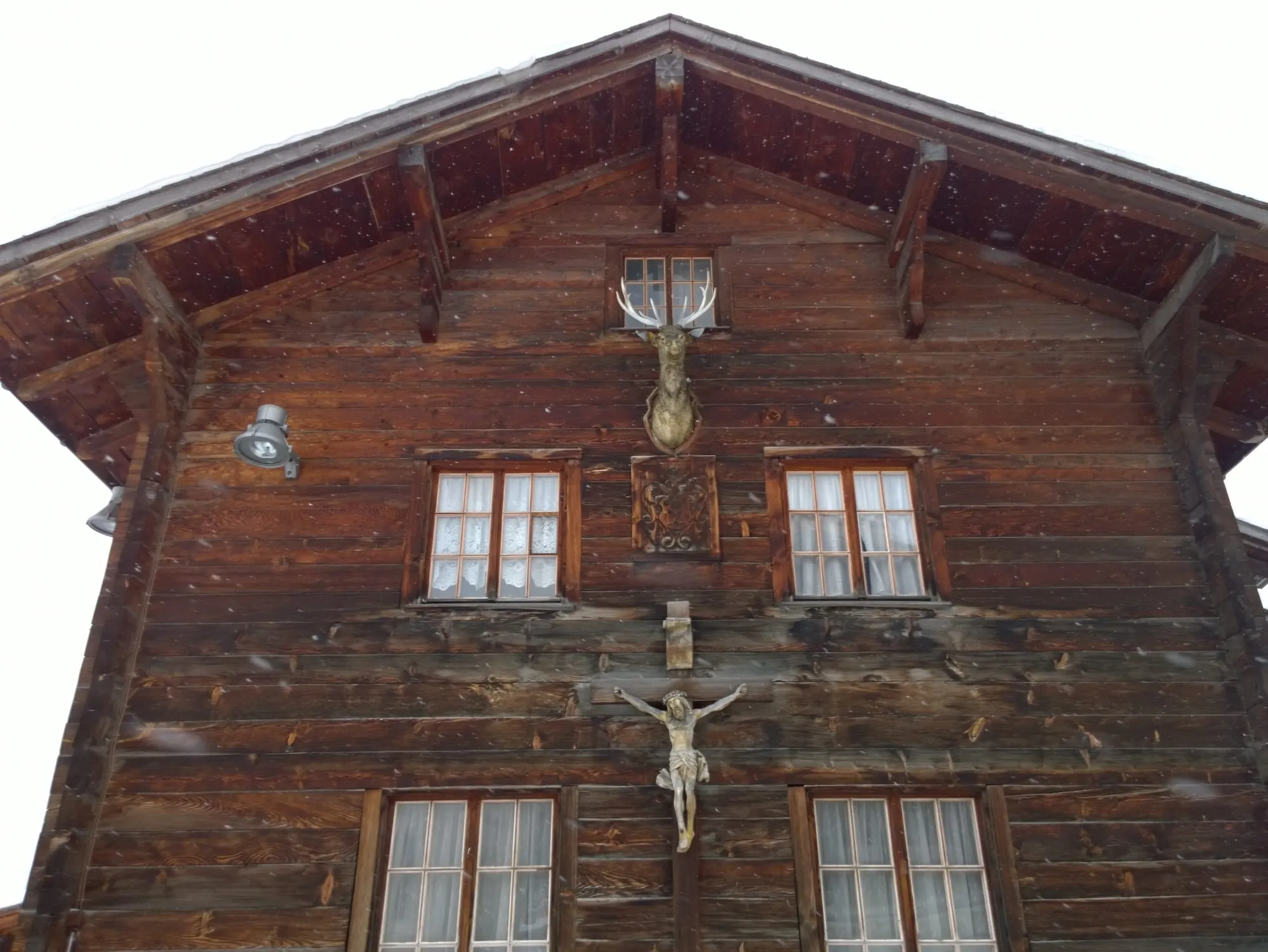 A traditional dark-timber Walliser house in the village of Münster, Obergoms.