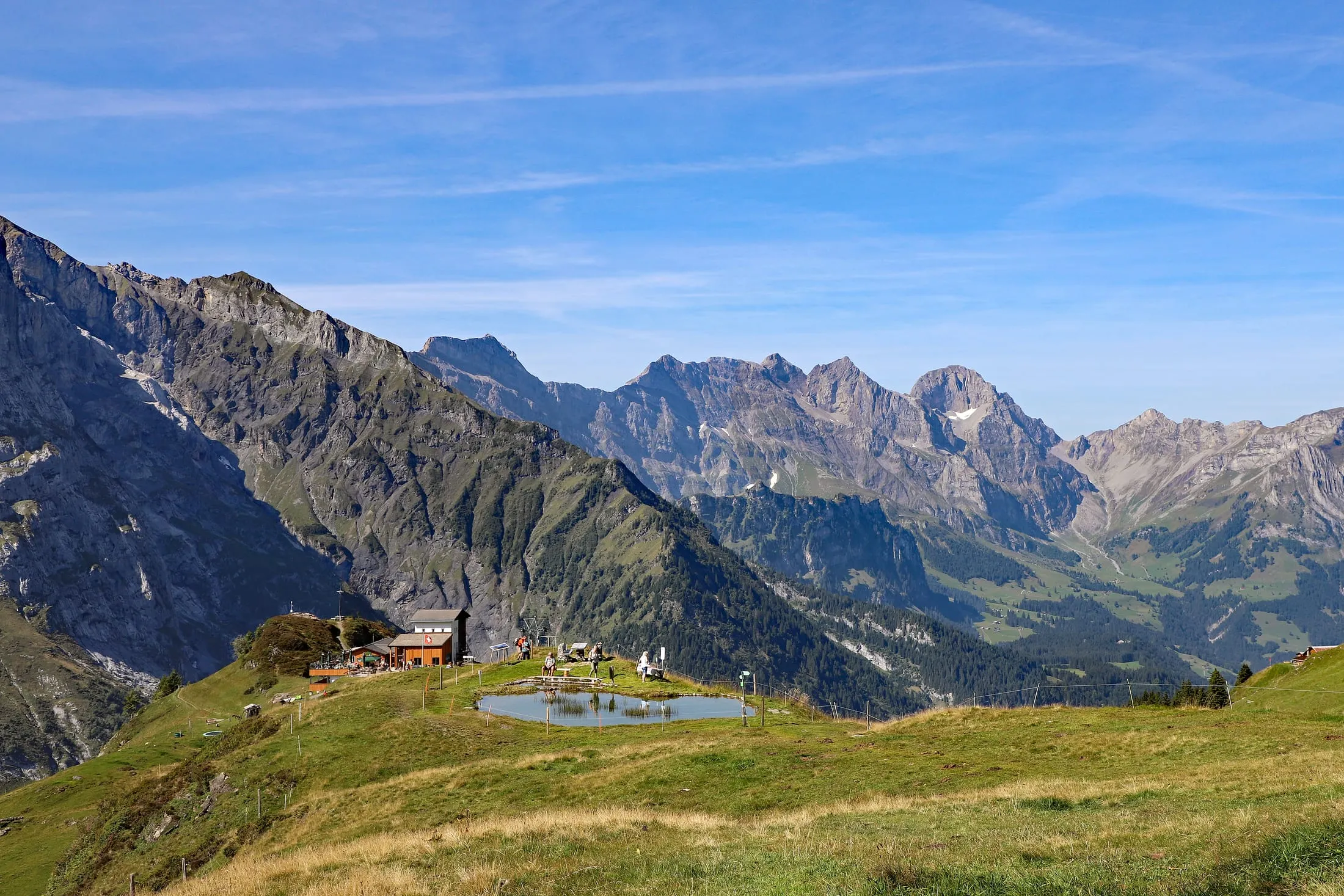 The Fürenalp high above Engelberg with the mountain restaurant and the cable car's top station, the Melchtal peaks behind.